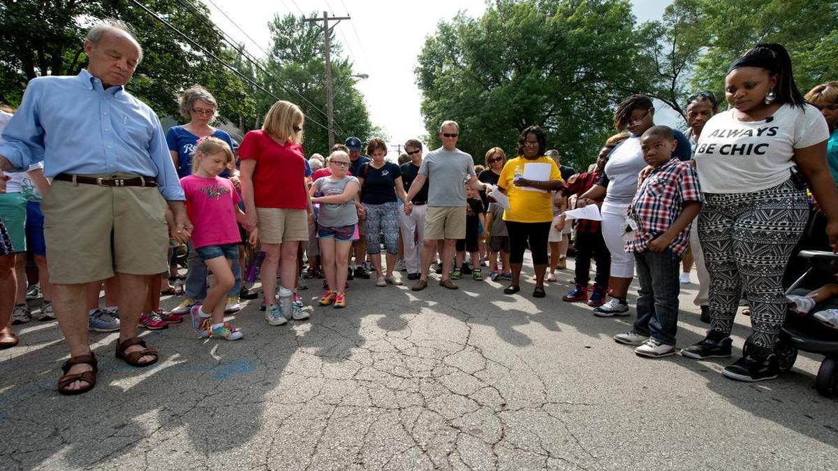 
Marchers came together in prayer on Sunday before walking through the neighborhood where Amorian Hale was killed. They set out from the home at 67th Street and Walrond Avenue where the youngster was shot.
