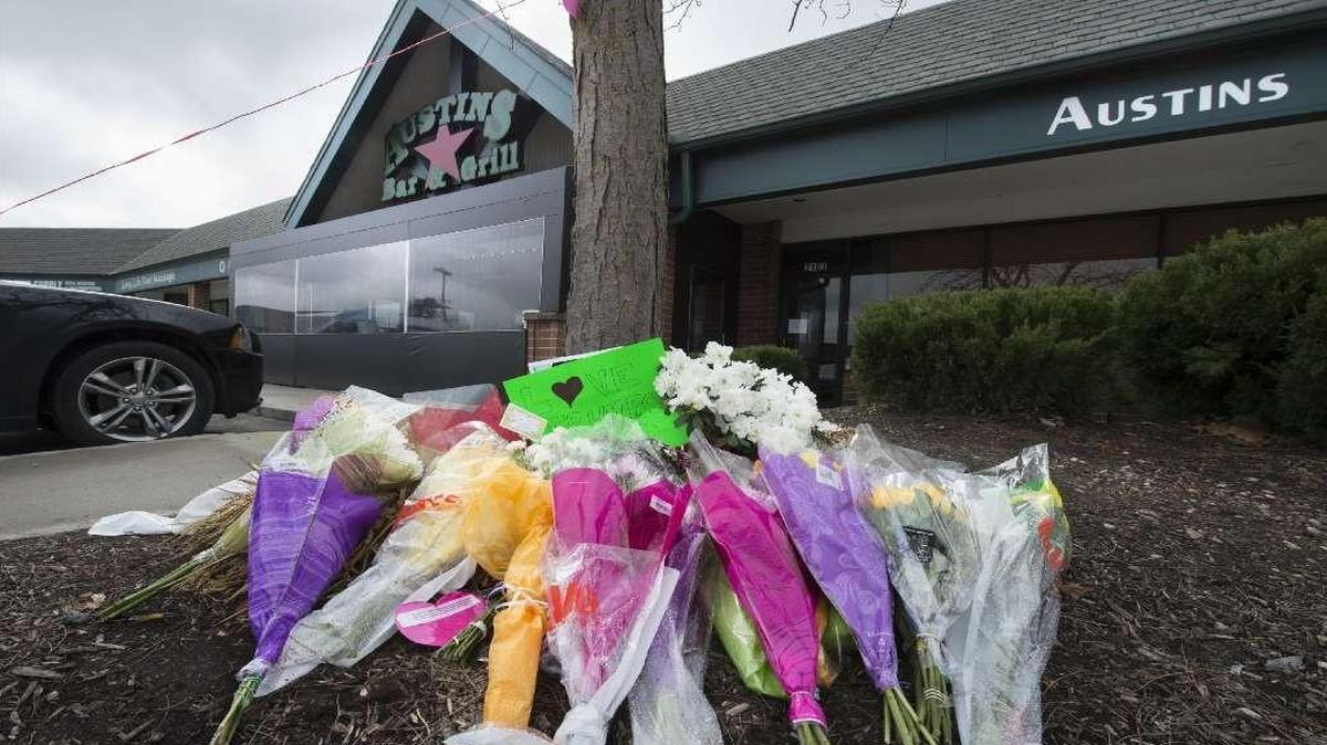 Austins Bar & Grill’s south Olathe location, which was the scene of Wednesday’s fatal shooting, reopened Saturday.