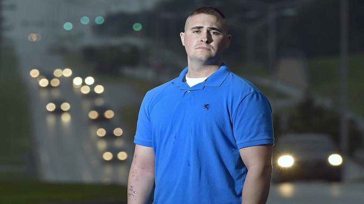 
Officer Trenton Gunter of the Overland Park police was injured in June at a traffic stop when a vehicle ran into his patrol vehicle and pinned him.

