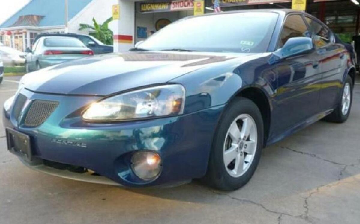 
Kansas City, Kan., police are looking for a black four-door vehicle and a teal Pontiac Grand Am, similar to this one, after an officer on patrol was caught in the middle of a gunbattle among occupants of the cars Monday on 18th Street near Rowland Avenue. Bullets missed the officer and the patrol car, and the two vehicles fled the scene.
