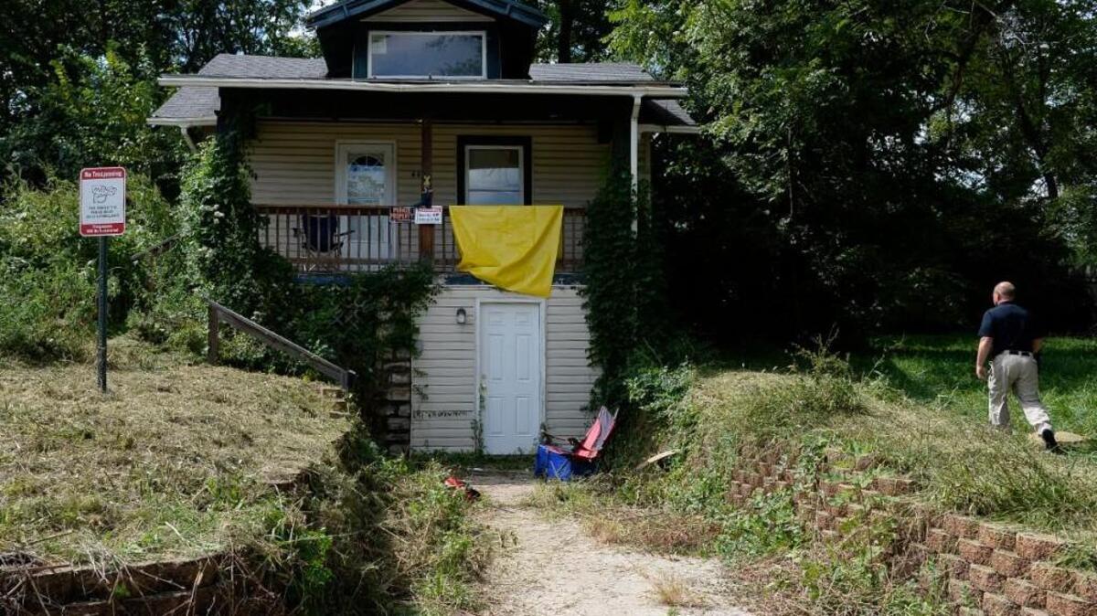 
A “No Trespassing” sign was visible Thursday afternoon in the yard of the house in Kansas City where Wednesday night police shot and killed a man after a 12-hour standoff.
