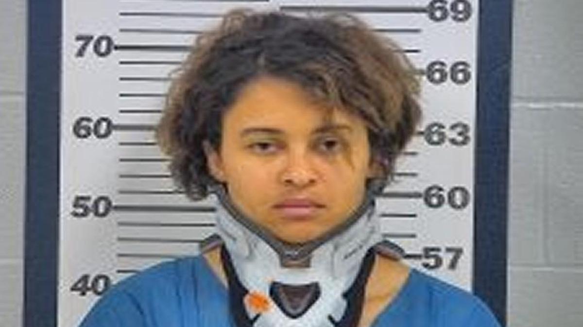 Aushena Warren is charged with abandoning her son Audrick’s body.