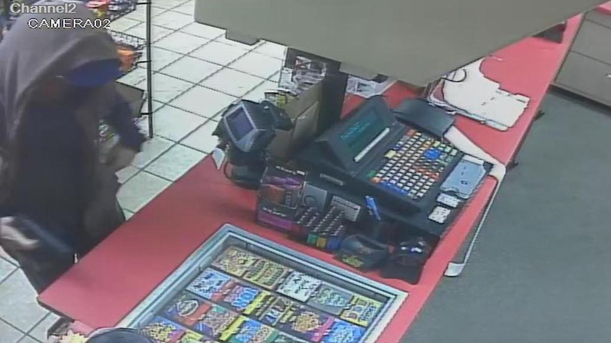 Authorities have released surveillance photos of a suspect in the armed robbery of a gas station in Edgerton.