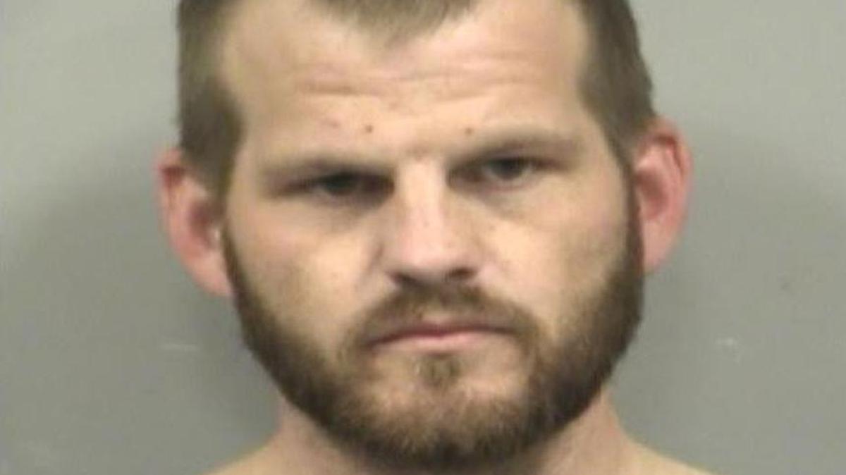 Eric Womack has been charged with second-degree murder and is being held at the Jackson County jail.
