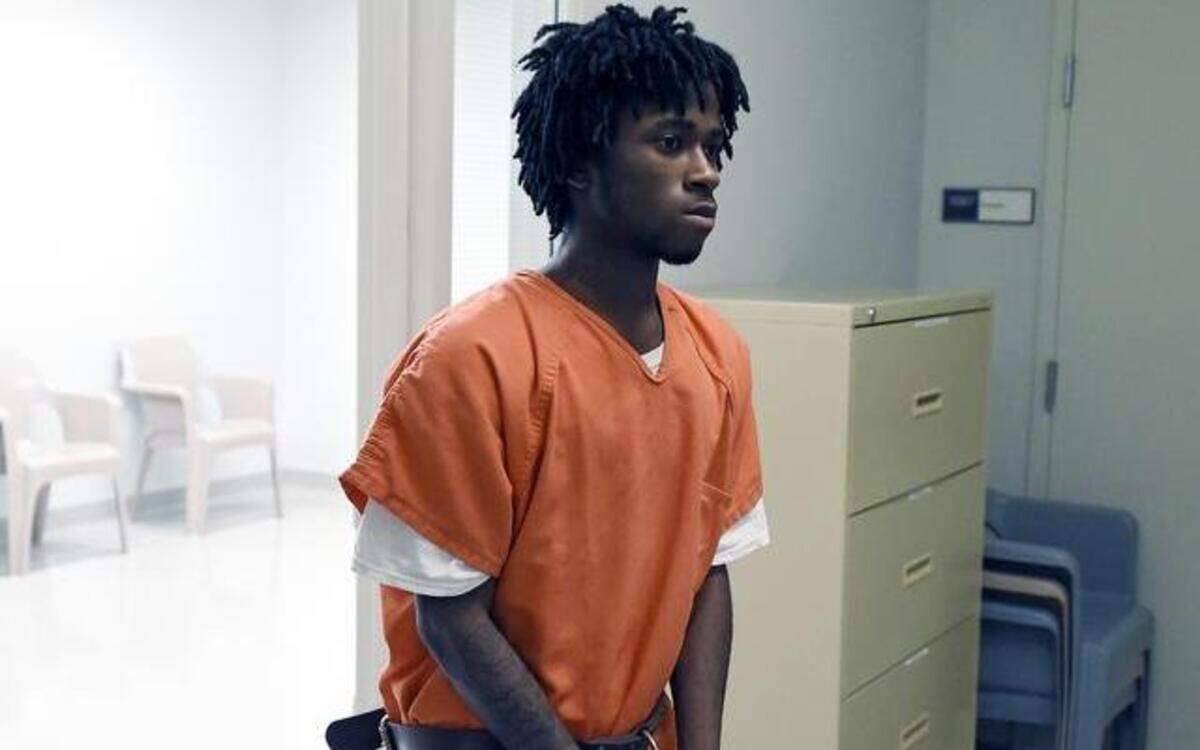 
Hakeem Willie Malik, 18, appeared Monday in Johnson County District Court via closed-circuit television from the Johnson County Jail, where he is being held in lieu of a $500,000 bond. He is one of four men charged in the killing of 44-year-old Jon Bieker in an attempted robbery Friday at She’s A Pistol, a gun store in Shawnee.
