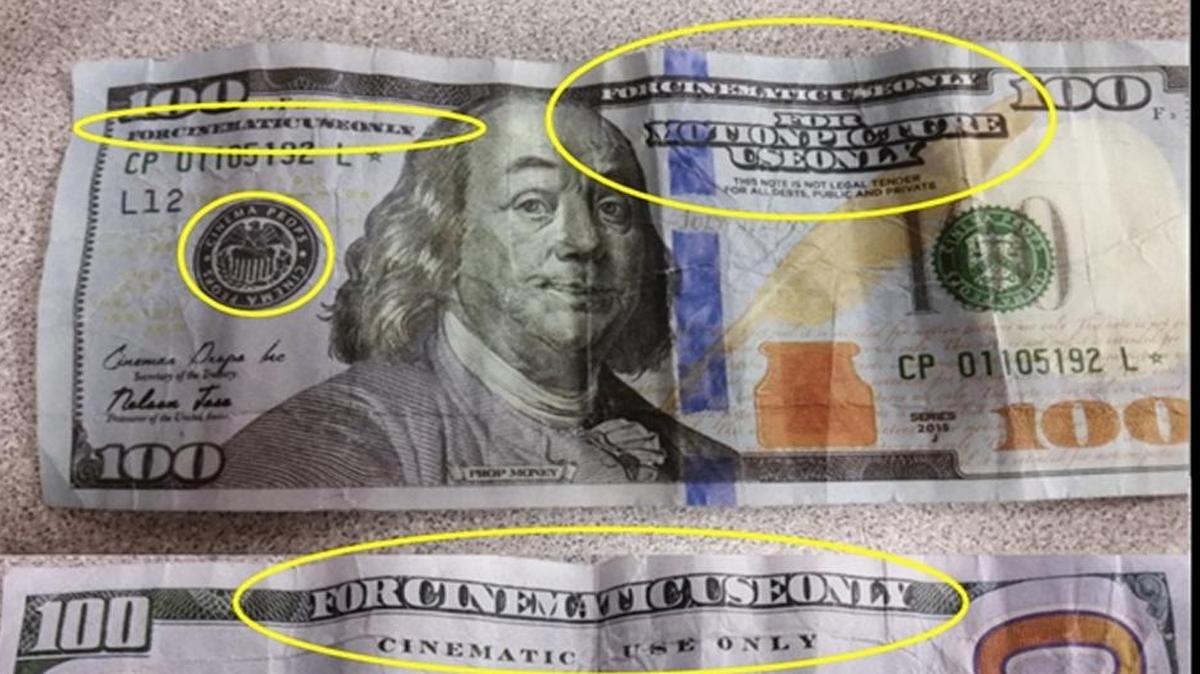 Movie prop money is very similar to real currency, but the phrase “For Cinematic Use Only” is printed on both sides of the fake bill.