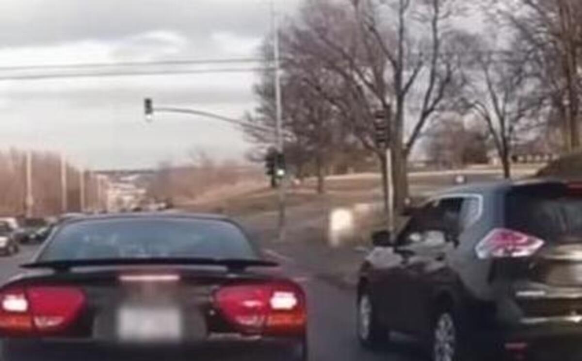 Dashcam footage captured a drive-by shooting on 23rd Street near Topping Avenue in Kansas City.