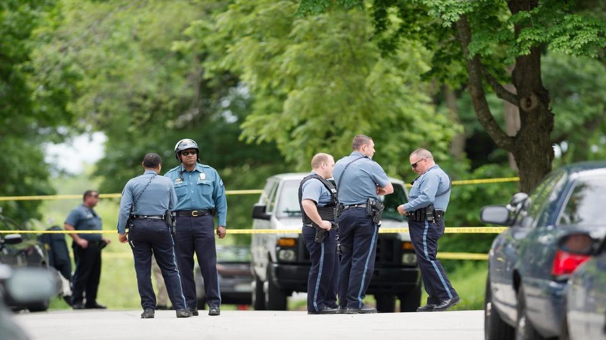 
Police continued to investigate a drive-by shooting that killed a child inside a house Sunday morning near 67th Street and Walrond Avenue. There were multiple bullet holes marked with police investigation tape on an outside wall of the residence.

