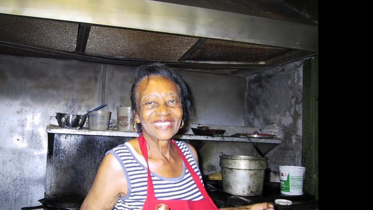 
Ruby McIntyre, in the kitchen of Ruby’s Soul Food Cafe, was known as “Miss Ruby” or even “Mama.”

