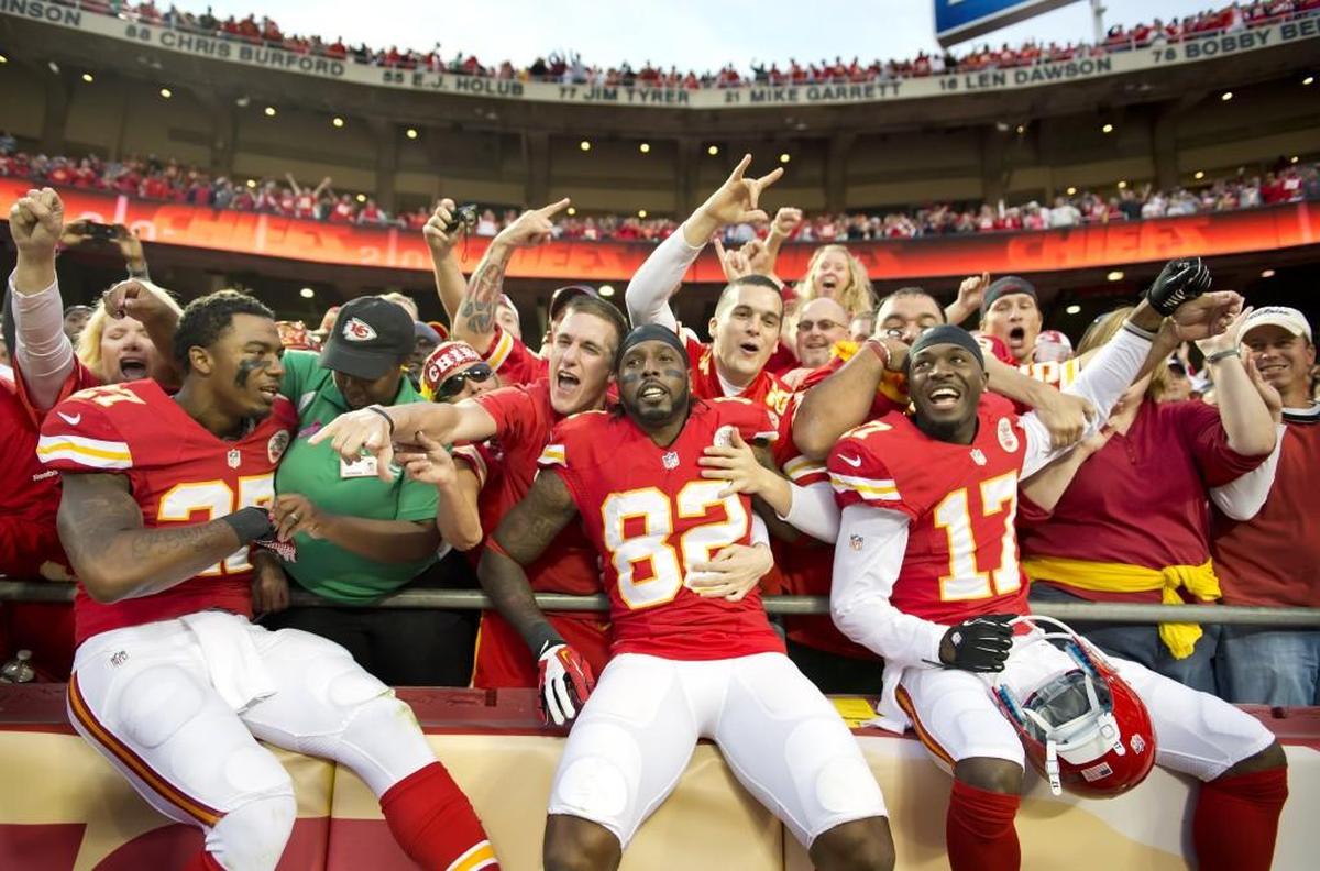 Dwaye Bowe (No. 82) and some of his Chiefs teammates celebrate a win during his playing days at Arrowhead Stadium in Kansas City.