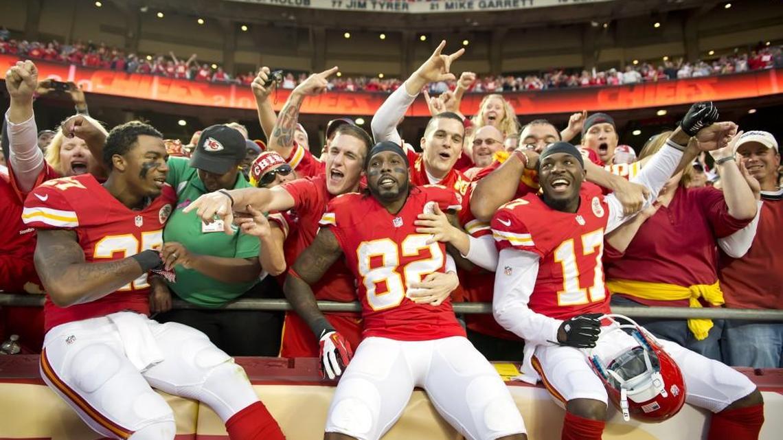 Dwaye Bowe (No. 82) and some of his Chiefs teammates celebrate a win during his playing days at Arrowhead Stadium in Kansas City.