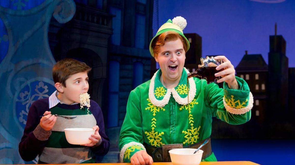 “I have been hired to be happy for two hours a night,” Erik Gratton said of the role of Buddy. He’s pictured here with Trey Middleton as Michael. “My entire job is to be happy. It’s incredible.”