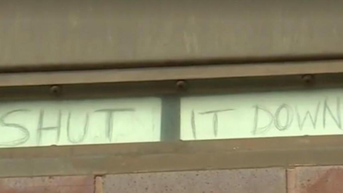 Jackson County jail inmates called for help with signs flashed at a TV news crew, according to KMBC.