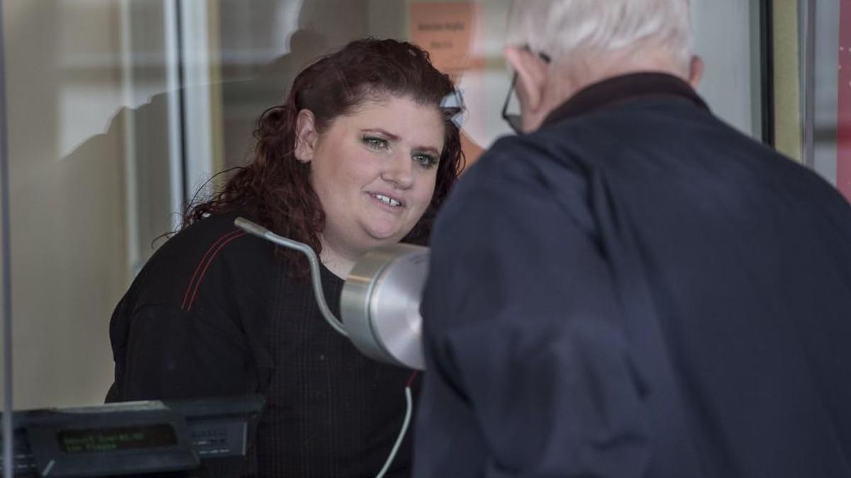 Becca Schunck, 39, has worked at the AMC Studio 28 theater in Olathe for 16 months — the longest she’s ever held a job. She survived a suicide attempt five years ago and now is building skills for life through therapy.