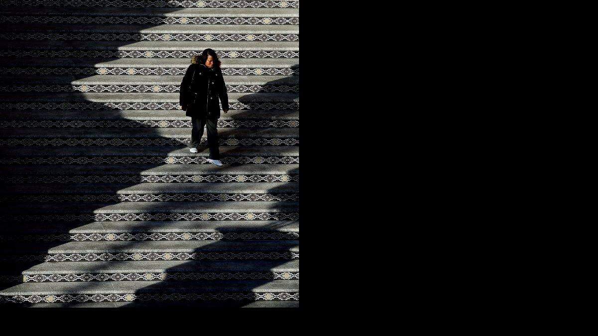 
Although winter coats have been a necessity so far this January, the next week will be a delight for fans of warm weather. On Wednesday, Heaven Jordan, from Chicago descended the steps at Valencia Place on the Country Club Plaza near 47th Street and Pennsylvania Avenue. Jordan, who works for Amtrak, is in Kansas City on business.
