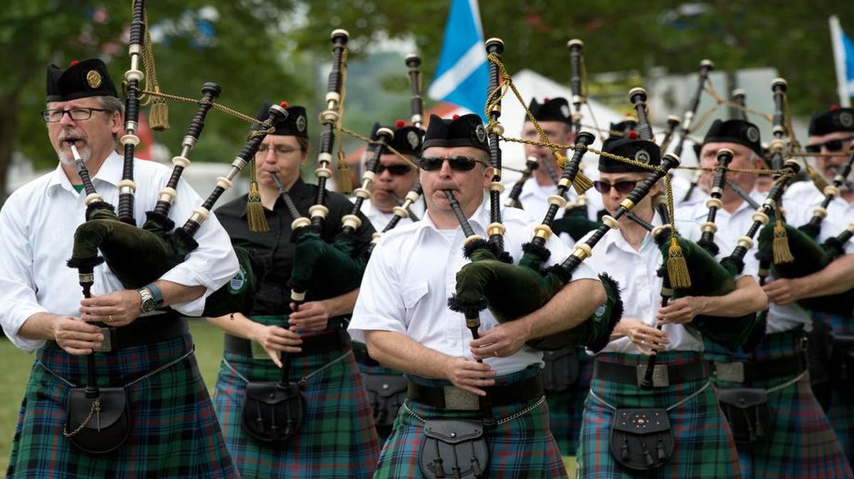
Members of the Kansas City Celtic Pipes and Drums played on Sunday at the Kansas City Scottish Highland Games & Celtic Festival in Riverside's E.H. Young Riverfront Park.
