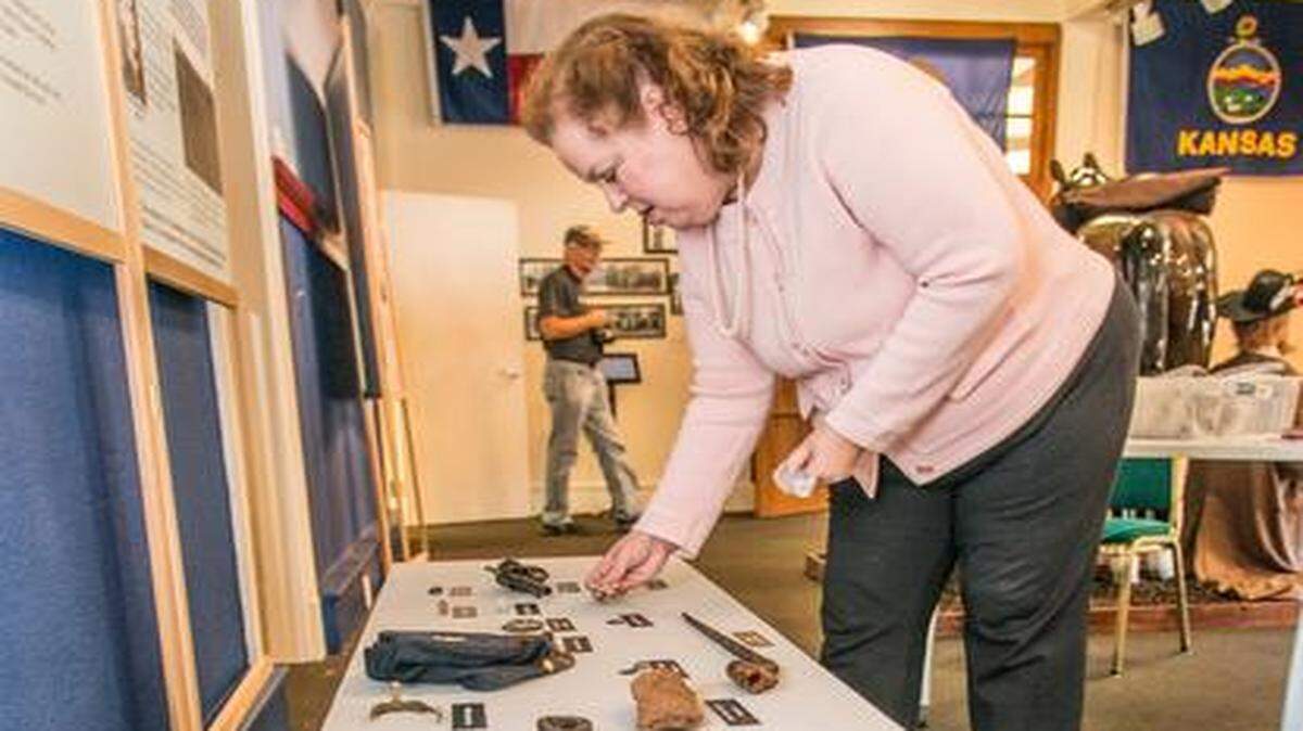 
Volunteer museum director Alisha Cole prepared an extensive display in anticipation of the 150th anniversary celebrations of the Battle of Westport at the Battle of Westport Visitor Center and Museum.
