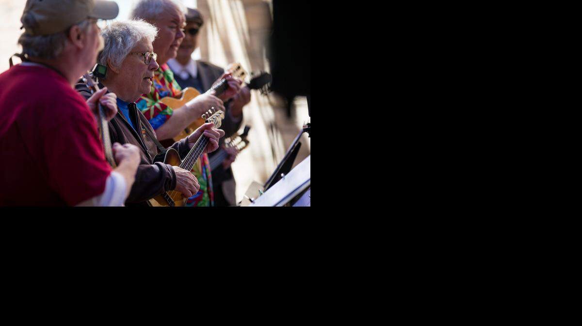 
Chuck Wilson (center) performed with his Meatballs Ukulele Band during Saturday’s ukulele gathering in the River Market.

 
