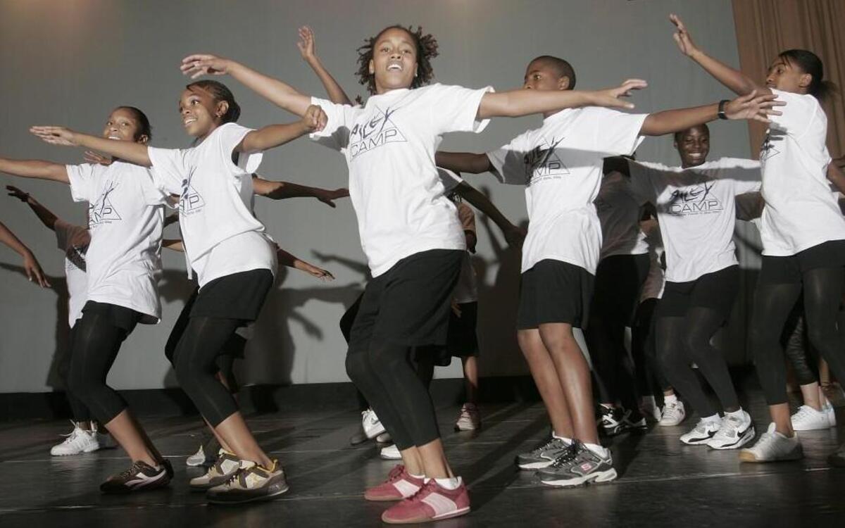 Students rehearse at a six-week Alvin Ailey dance camp at Wyandotte High School in Kansas City, Kan.