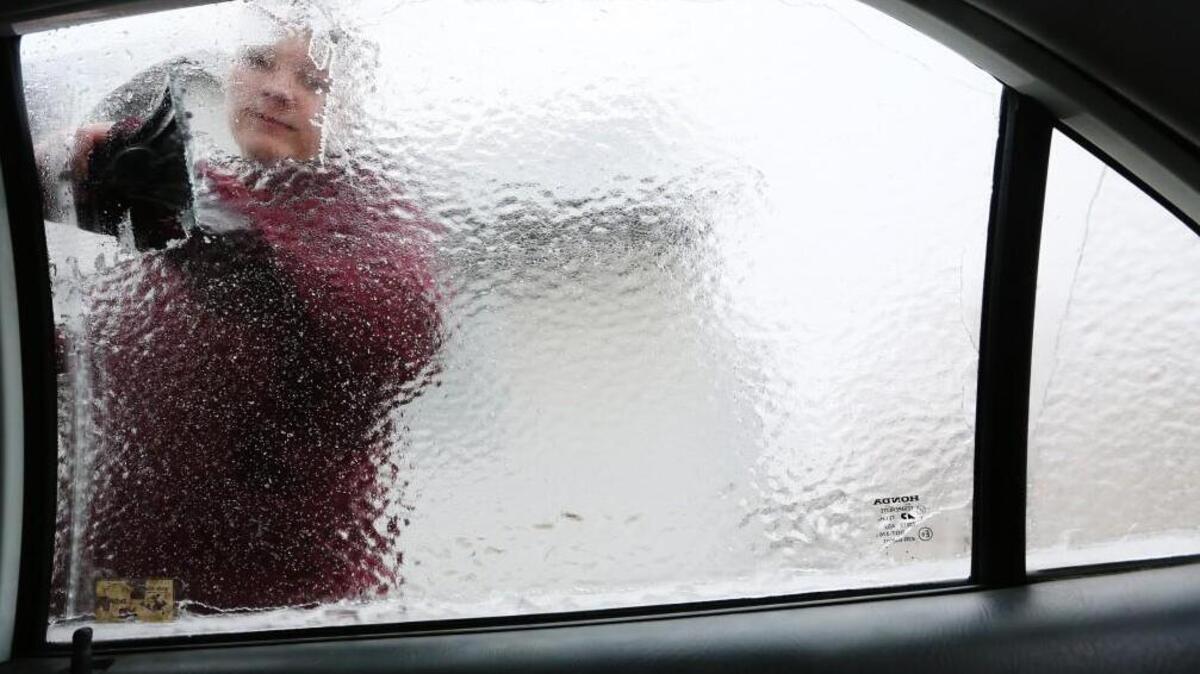 The Lawrence Police Department encourages people to scrape their windows and not let the car’s heater do that work.