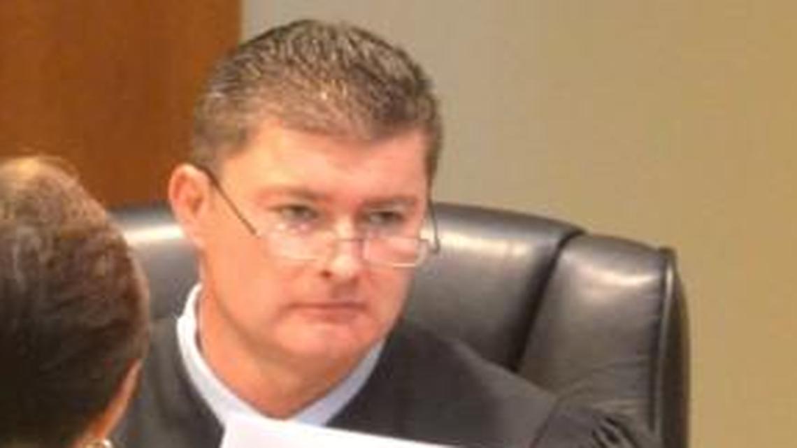 Judge R. Michael Wagner (seated) in court in 2013. Wagner was found to be exceeding his authority when in 2015 he ordered a Belton trans teen to undergo a mental evaluation in a change-of-name case.