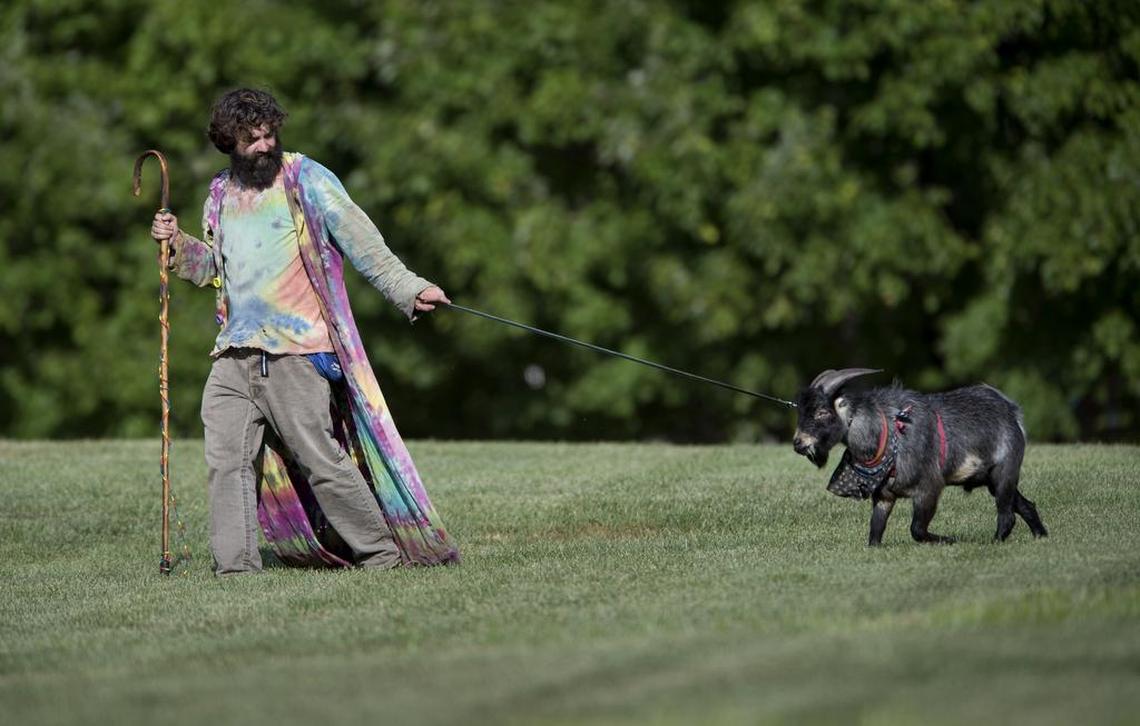 Erick Brown and his goat Deer are pictured in a 2015 photo. They were in Independence on Thursday, Aug. 13, 2015.