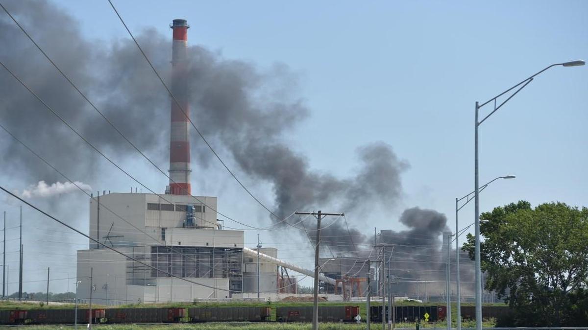 A fire at the Hawthorne power station in the East Bottoms of Kansas City is seen in 2016. A recent air quality report gave Jackson and Wyandotte counties low air quality grades due to air pollutants commonly caused by power plants and industry.