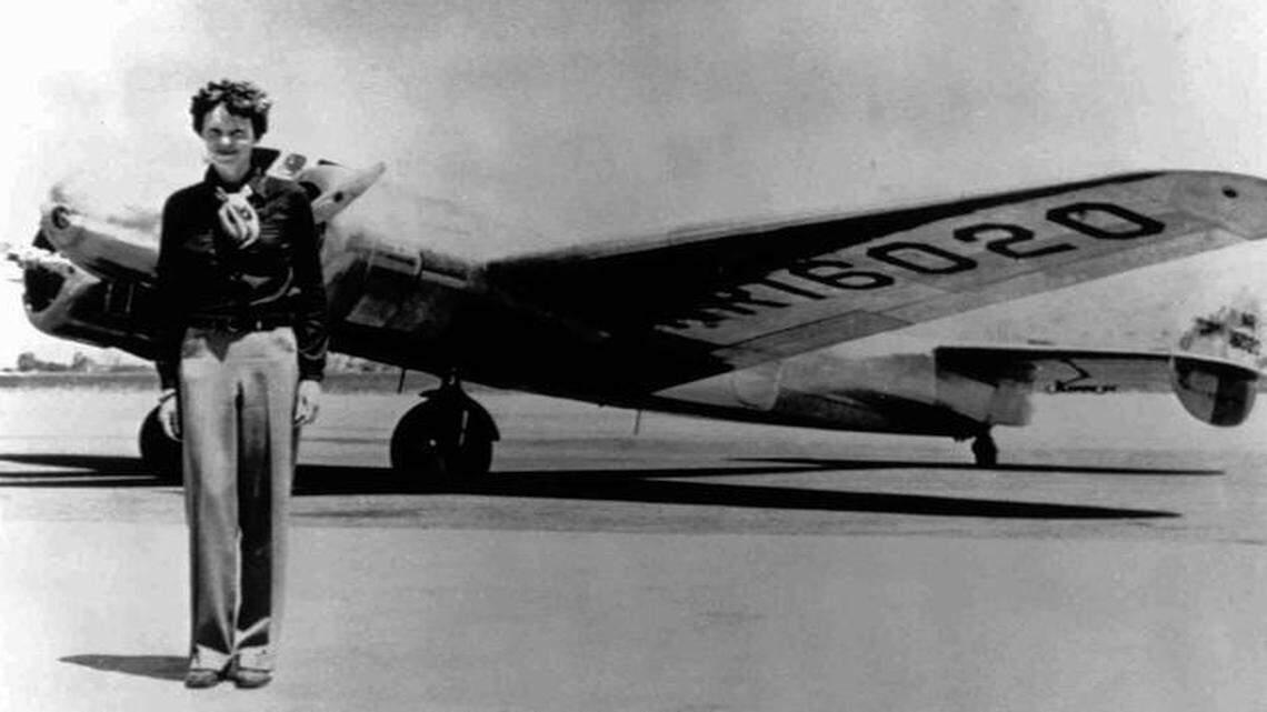 
Amelia Earhart and her Lockheed Electra 10E; she vanished over the Pacific in July 1937. 
