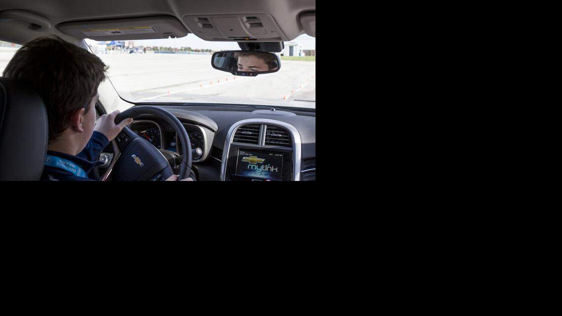 
Tanner Shoaf of Kansas City, Missouri drove around an obstacle course during a teen safe driving event at the Kansas Speedway on October 19th, 2014. The event taught teens defensive driving on wet and dry pavement. The event was offered free to the public.
