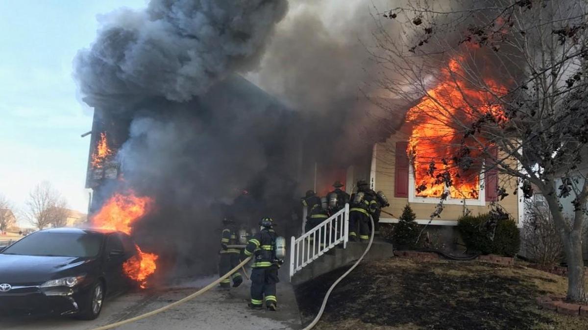 A fire Sunday afternoon heavily damaged a Kansas City, North, house.