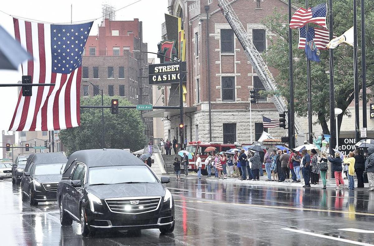 The funeral procession for Wyandotte County Sheriff’s Deputies Theresa King and Patrick Rohrer made its way down 7th Street in Kansas City, Kan., Thursday, June 21, 2018.