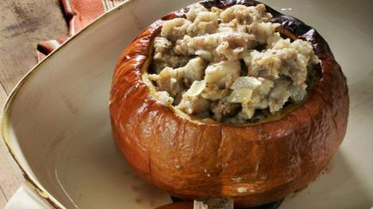 
Stuffing filled roasted pumpkin uses the squash as an edible bowl perfect for entertaining. The pumpkin can be cut into wedges and eaten along with the bread stuffing.
