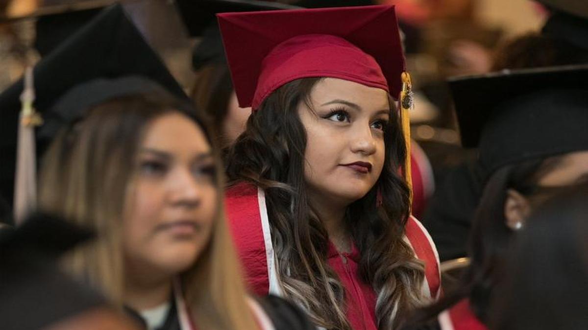 Jessenia Lopez, a class 3 scholar and graduate of Park University, listened to the speeches during the Kauffman Scholars Foundation graduation ceremony Saturday, June 10, 2017 at Arrowhead Stadium. Kauffman Scholars, a multiyear college access and scholarship program launched by the Kauffman Foundation in 2003, honored its eighth and final class of students during a large-scale graduation ceremony The program was designed to help low-income students in Kansas City prepare for and complete a college education.
