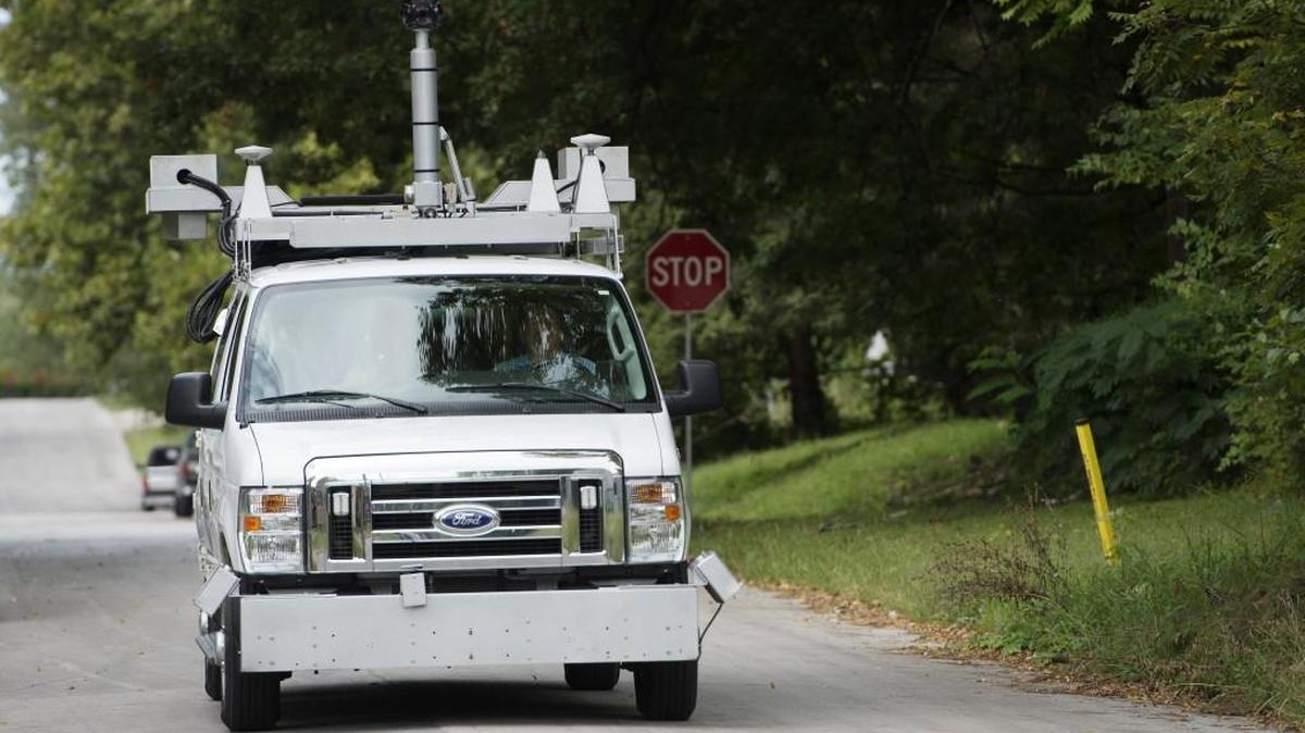
Winfield Cash, a field technician for Stantec, drove a specialized van loaded with lasers and cameras while computers collected data on the road conditions last month in Kansas City.

