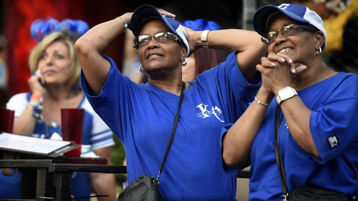 As any chance of a Royals late rally faded Wednesday evening, twin sisters Terrie Allen (middle) and Sherrie Allen (right) watched, along with Franke Henthorn (left) as Totonto went on to win, 7-1 in game five of the American League Championship Series. Kansas City fans again packed the KC Live venue to watch the game.
