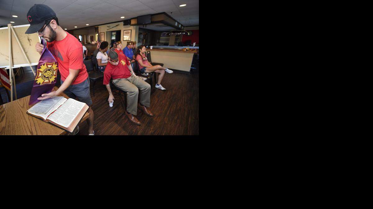 The Lawrence VFW post’s new social spot is in the center of Massachusetts Street nightlife. Senior vice commander Johnathan Duncan of Kansas City prepared for a recent meeting of members.