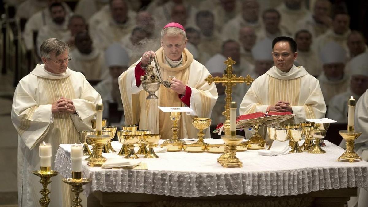 At a Mass in November installing James V. Johnston Jr. (center) as bishop of the Diocese of Kansas City-St. Joseph, he was joined by Deacon Dien Nguyen and Deacon Dwayne Katzer (left). On Tuesday, Katzer was removed from service.