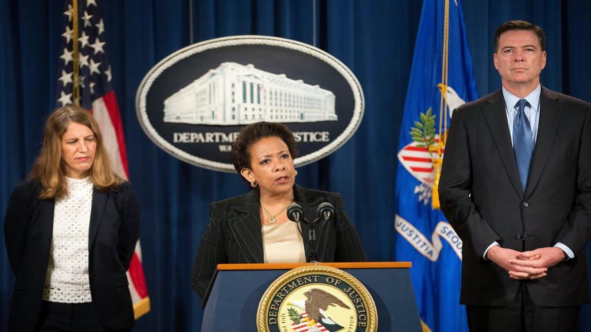 
Attorney General Loretta Lynch (center) said 243 people, including doctors and nurses, have been charged in a nationwide health care fraud sweep. Health and Human Services Secretary Sylvia Burwell and FBI Director James Comey spoke at a news conference about the investigation Thursday at the Justice Department in Washington.
