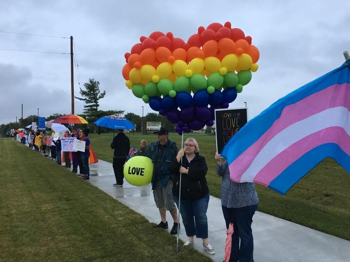A group of LGBTQ supporters gathered Tuesday morning outside Olathe Northwest High School.