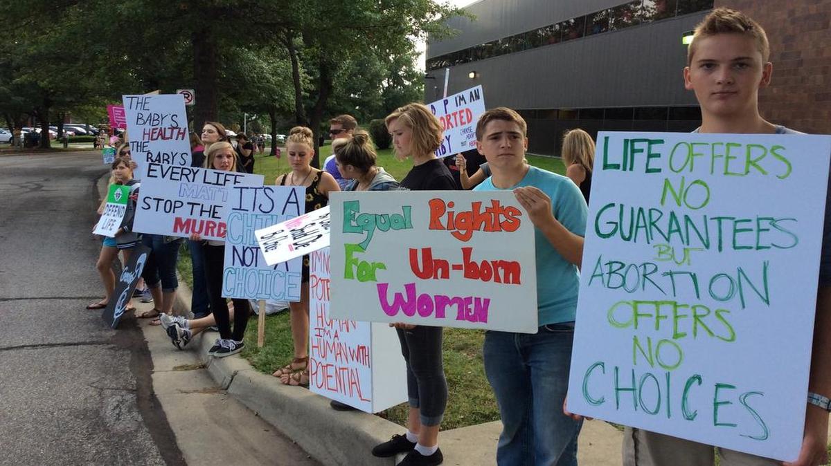 
The Overland Park protest of Planned Parenthood was one of more than 300 that were planned across the nation Saturday.
