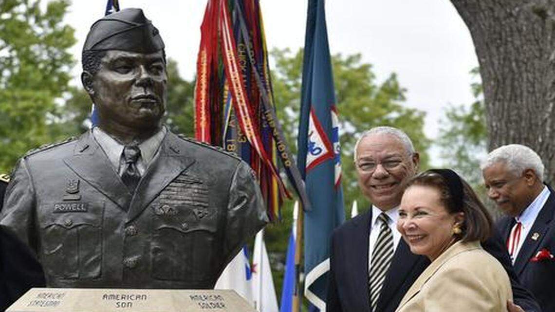 A bust honoring retired Gen. Colin Powell, former secretary of state and chairman of the Joint Chiefs of Staff, was dedicated at a ceremony at Fort Leavenworth Friday. Powell has been a longtime champion of recognizing the legacy of the Buffalo Soldier at the post. Powell and his wife, Alma (front right), stood near the bust after the unveiling.