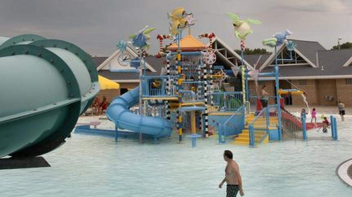 
On a typical late July day, pools in the area would be packed with people looking for relief from the heat. The sky was overcast and attendance was sparse Saturday at Splash Cove in Shawnee. 
