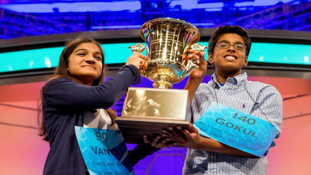 
Vanya Shivashankar, 13, of Olathe, and Gokul Venkatachalam, 14, of suburban St. Louis, held high the championship trophy as co-champions after winning the finals of the Scripps National Spelling Bee Thursday night in Oxon Hill, Md.
