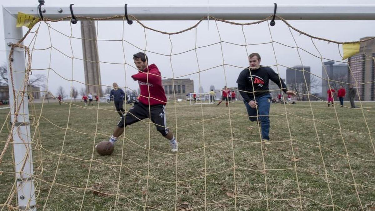 Nearly 170 soccer players turned out for a tournament at the National World War I Museum. Cameron Wallace (left) of Kansas City kicked the ball toward the goal Saturday as Michael Taylor of Kansas City, Kan., ran to cover.