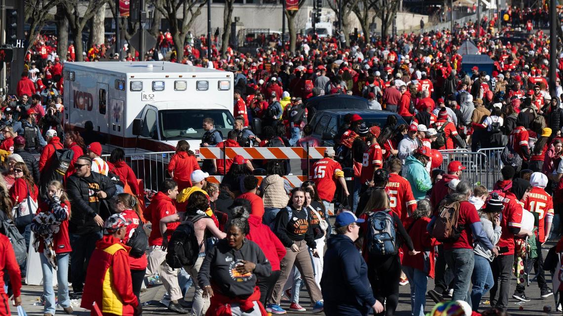 Chiefs fans move toward the exit as an ambulance arrives on scene after shots were fired at the Kansas City Chiefs Super Bowl rally on Wednesday, Feb. 14, 2024, at Union Station in Kansas City.