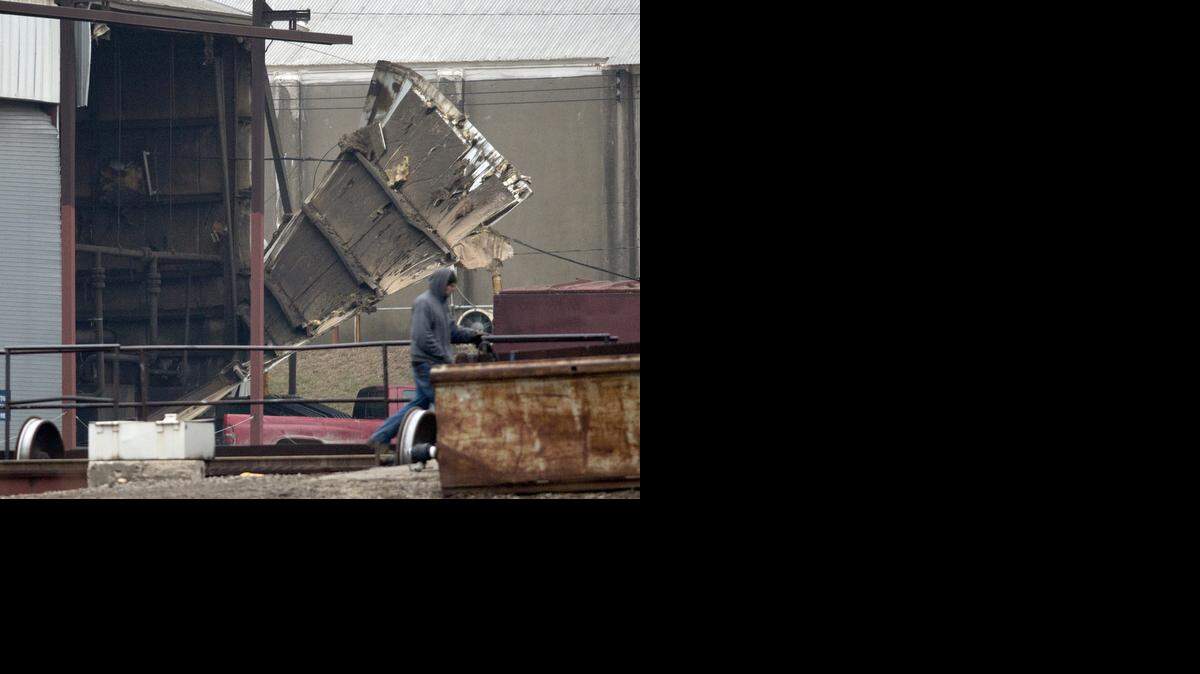 
An explosion about 2 p.m. at GBW Rail Services, 15624 258th Road southwest of Atchison, Kan., sent six workers to the hospital. Fire and medical responders told officials that a rail car, possibly containing gasoline, exploded. The force of the blast on Thursday, Dec. 11, 2014, was evident by panels blown from the building.
