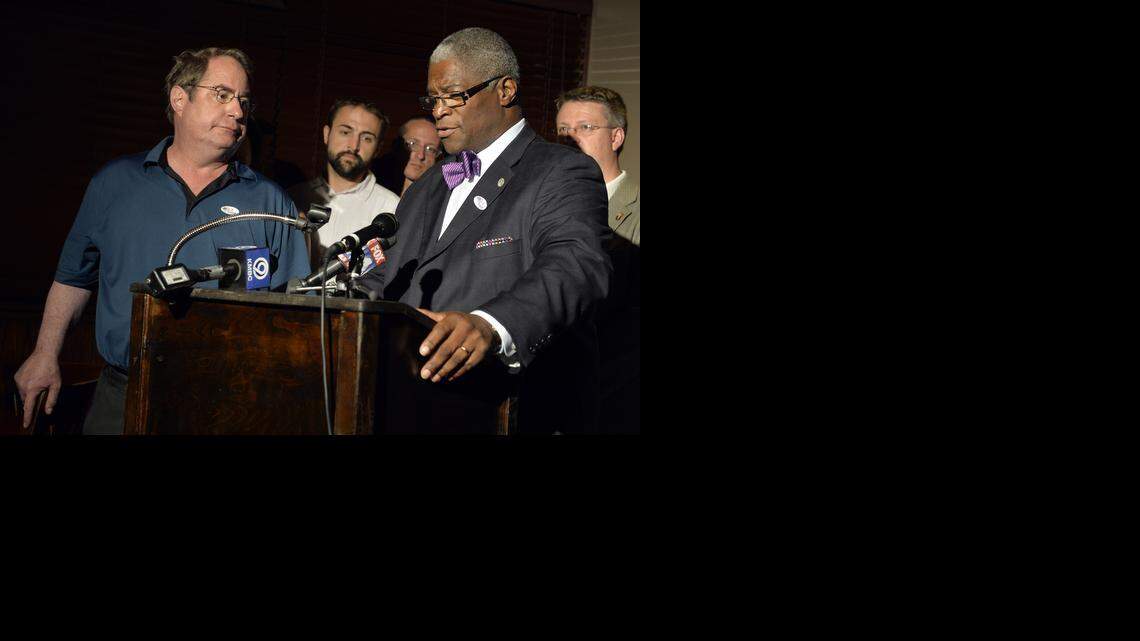 
Connect-KC and supporters of Question A, which would create a transportation development district in Kansas City, gather at Gates BBQ on Main Street and Linwood to watch election returns of the Missouri primary election Tuesday, Aug. 5, 2014. Councilman Jim Glover (left) listens as Mayor Sly James addresses the crowd. Voters rejected the proposal with 61 percent voting against, 39 percent for.
