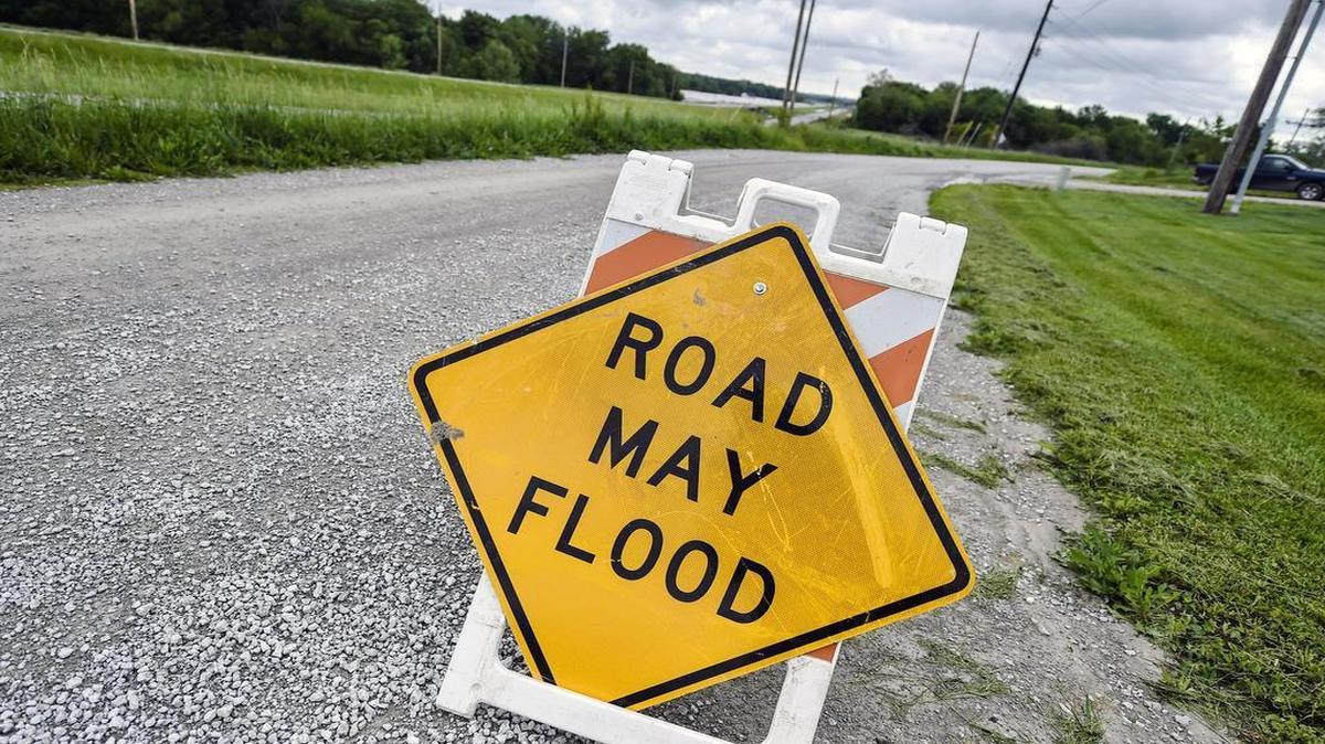 
There might be more of this ahead: a flood warning sign near northbound U.S. 69 in Mosby, Mo. 
