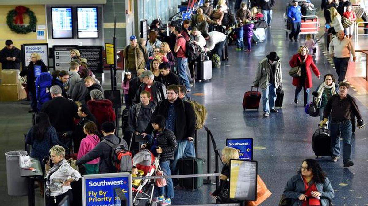 
Some of the 580,000 expected to pass through Kansas City International Airport this holiday season lined up Tuesday. 
