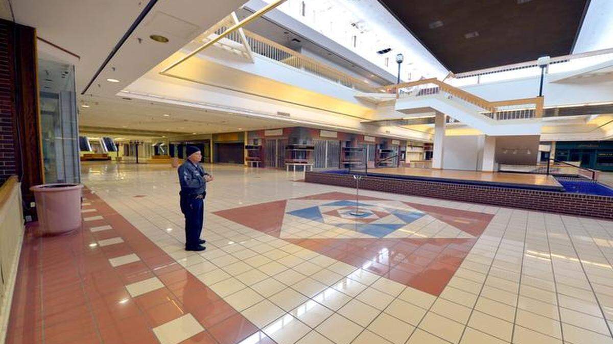 
When security guard Vernon May first started patrolling Metcalf South more than 30 years ago, there were 169 stores, he says. Now he watches over an almost abandoned mall.
